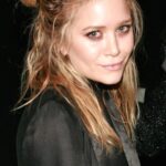 kıvırcık saç yarım topuz modeli